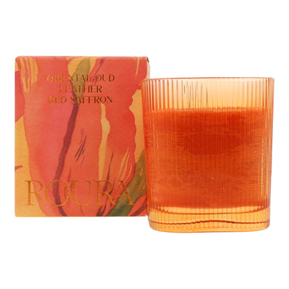Vela perfumada Oriental Oud en vaso rayado naranja 9x8 cm Roura