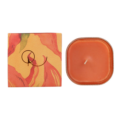 Vela perfumada Oriental Oud en vaso rayado naranja 9x8 cm Roura